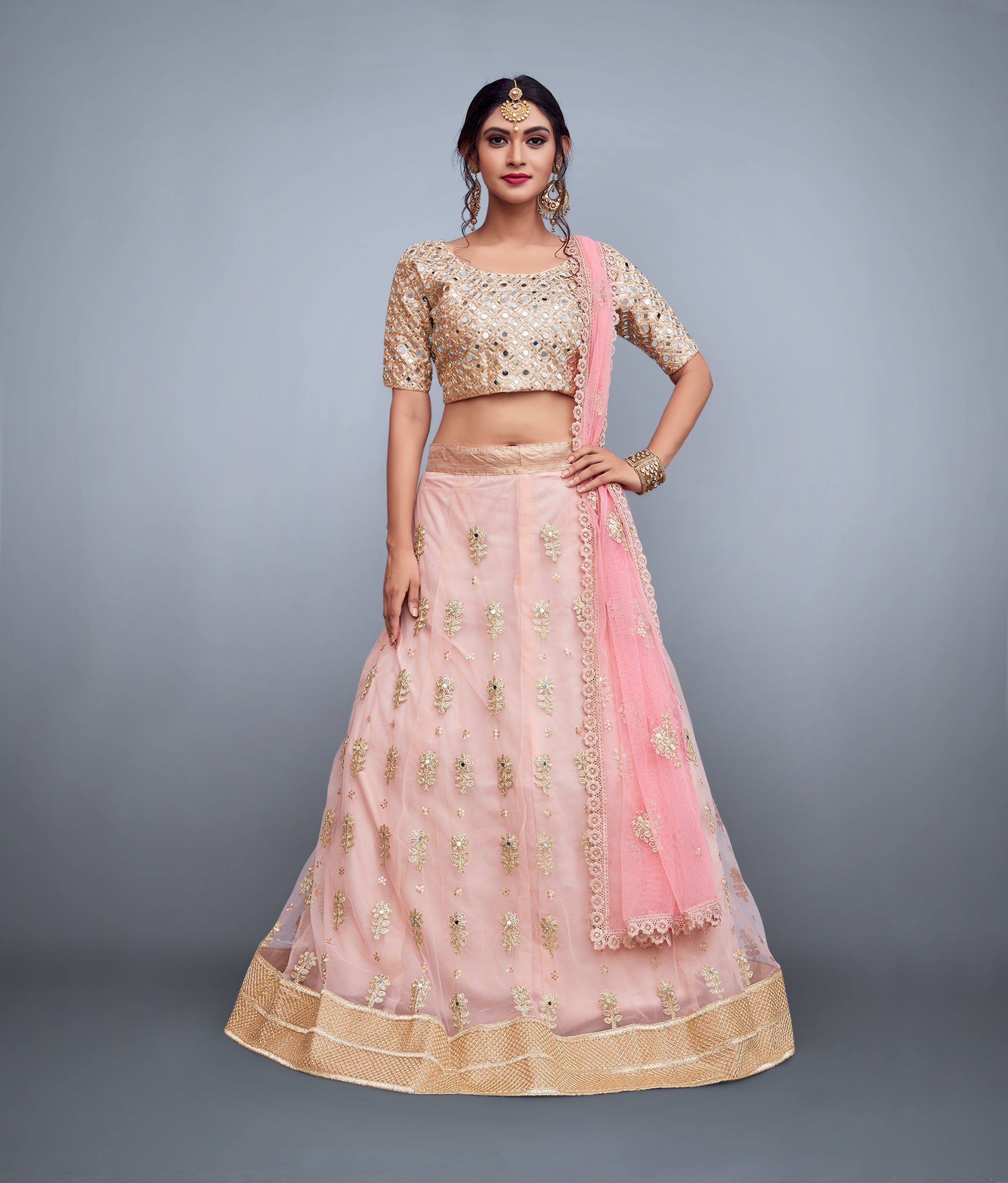 Soft Net Lehenga Choli With Embellished Mirror Work And Cut Work Dupatta