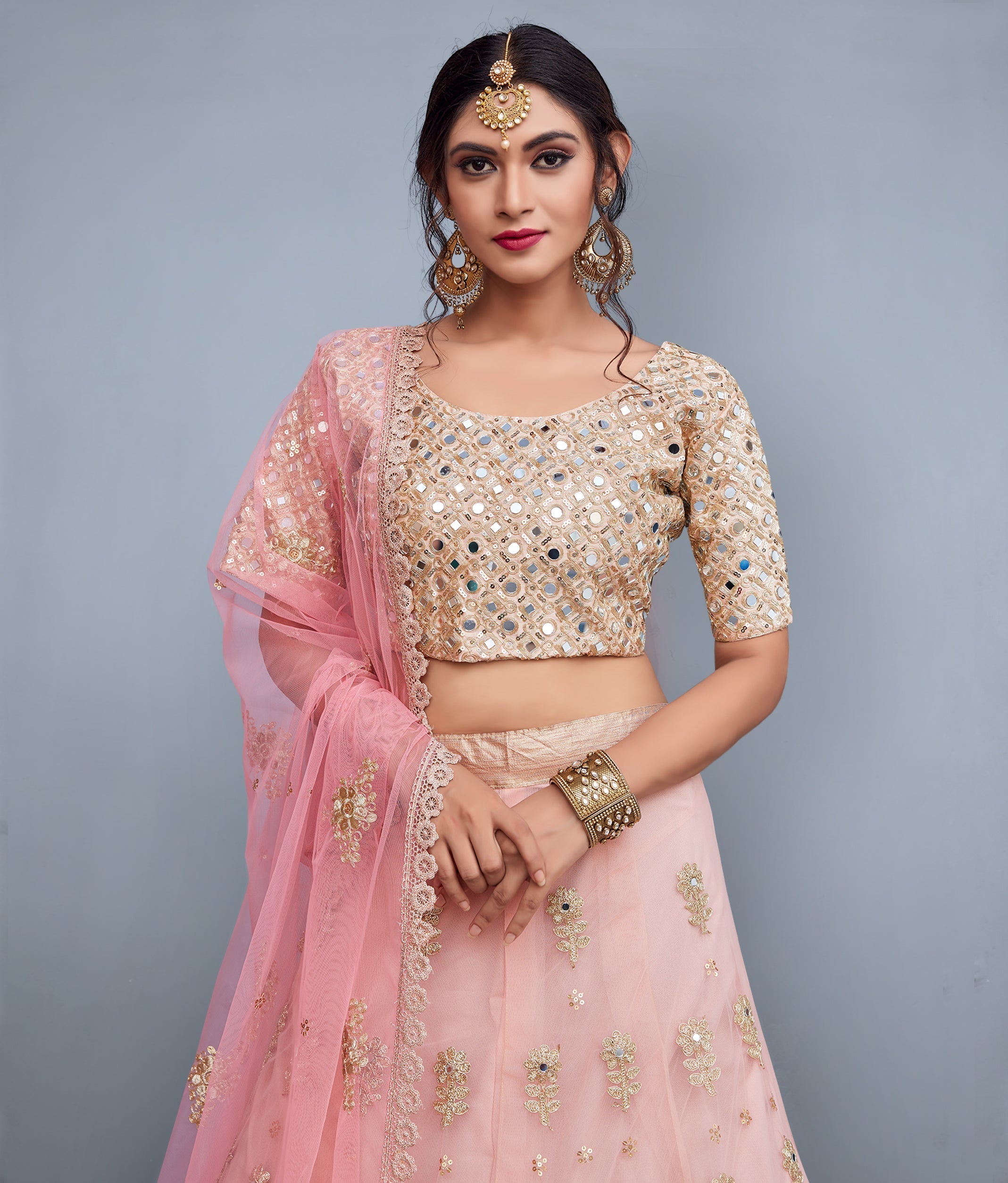 Soft Net Lehenga Choli With Embellished Mirror Work And Cut Work Dupatta