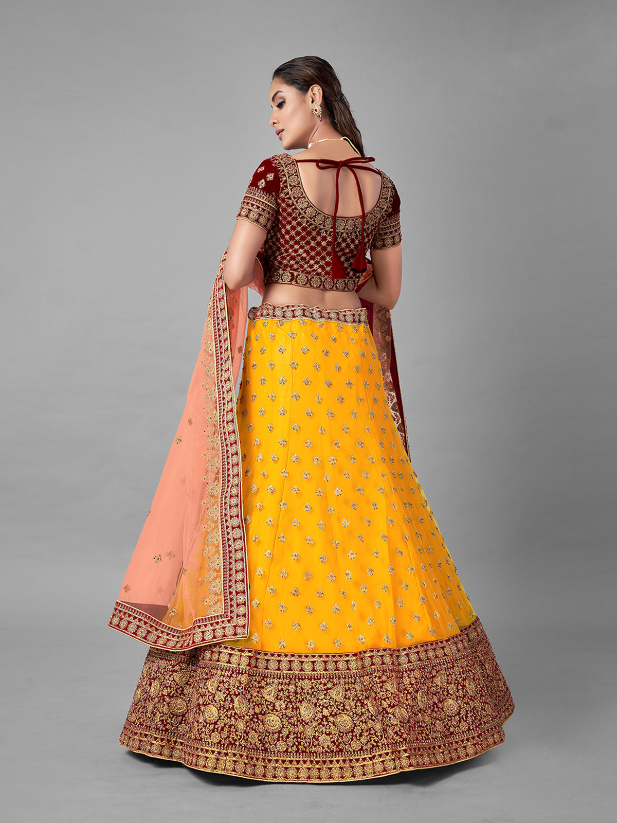 Mustard Embroidered Velvet Semi Stitched Lehenga With Unstitched Blouse