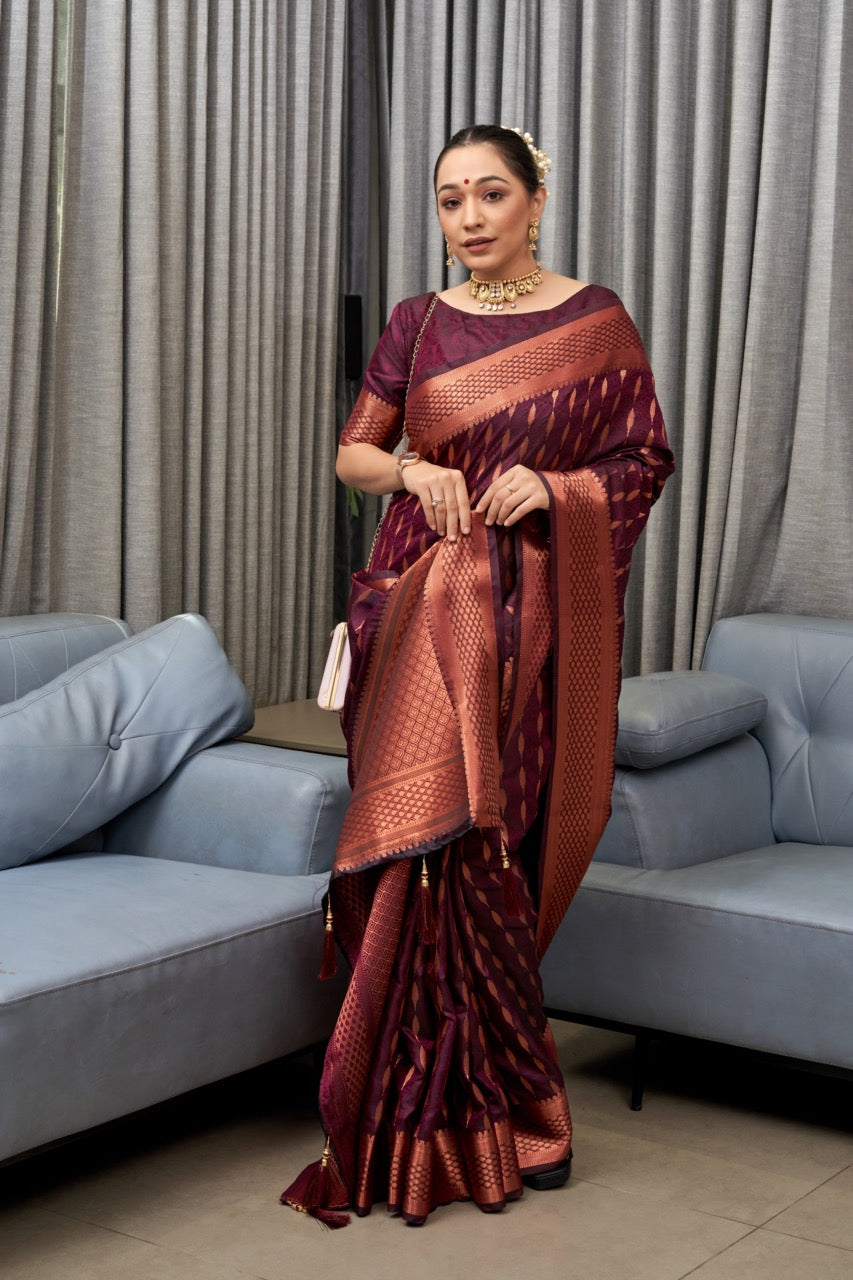 Hypnotic Wine Soft Silk Saree With Appealing Blouse Piece