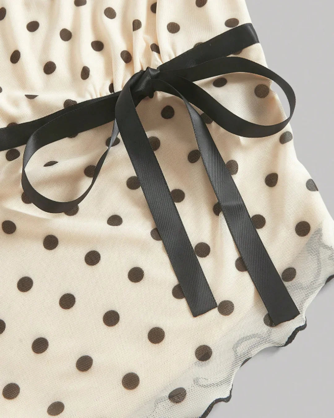 Asymmetric Bow Tie Polka Dot Ruched Hem Top