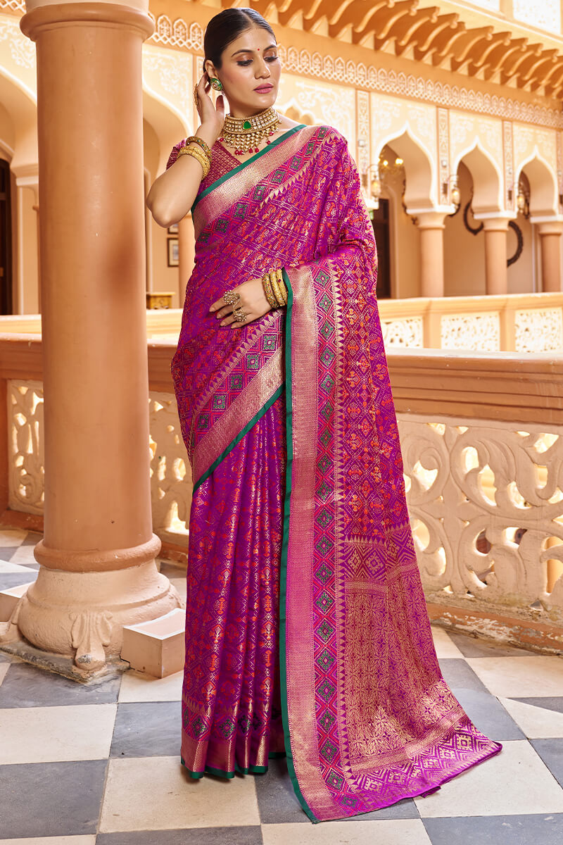 Quintessential Purple Soft Patola Silk Saree With Gossamer Blouse Piece
