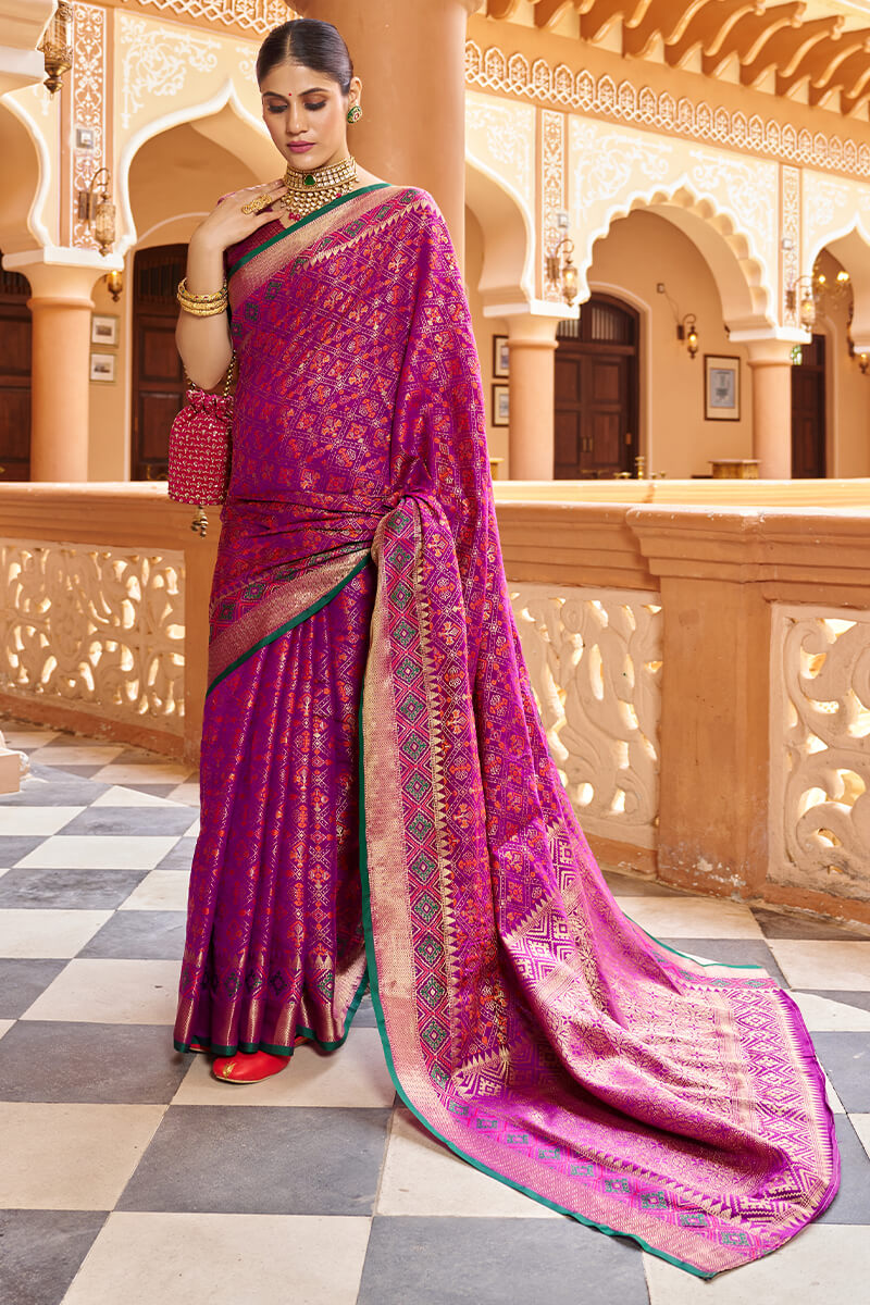 Quintessential Purple Soft Patola Silk Saree With Gossamer Blouse Piece