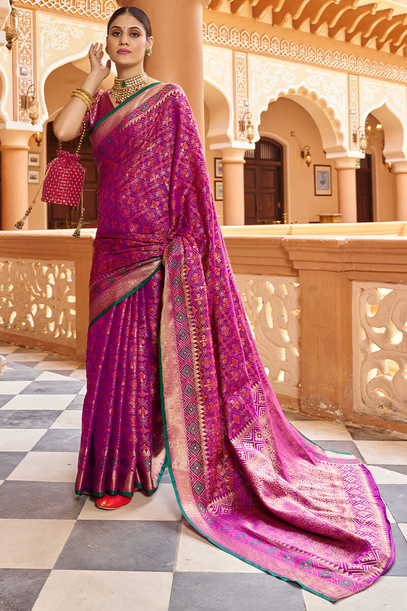 Quintessential Purple Soft Patola Silk Saree With Gossamer Blouse Piece
