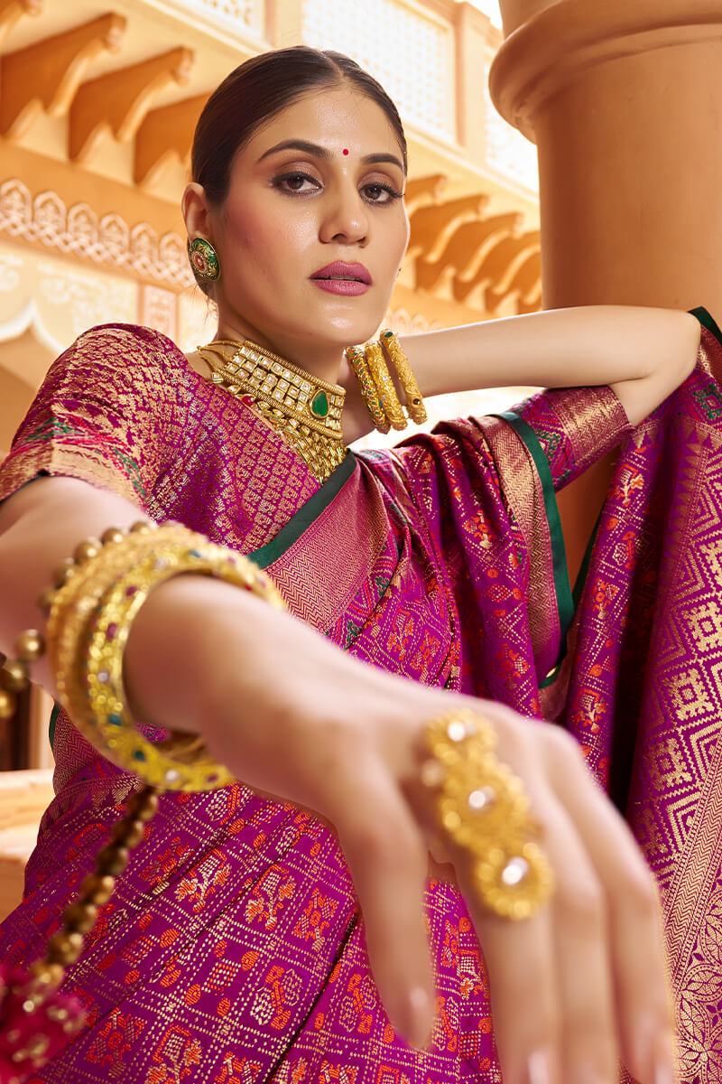 Quintessential Purple Soft Patola Silk Saree With Gossamer Blouse Piece