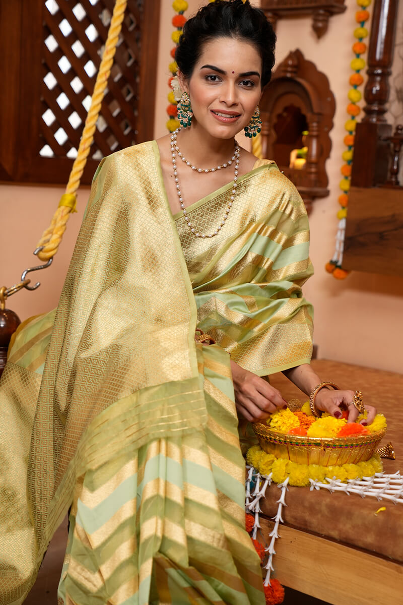 A glam Mehndi Organza Silk Saree With Super Blouse Piece