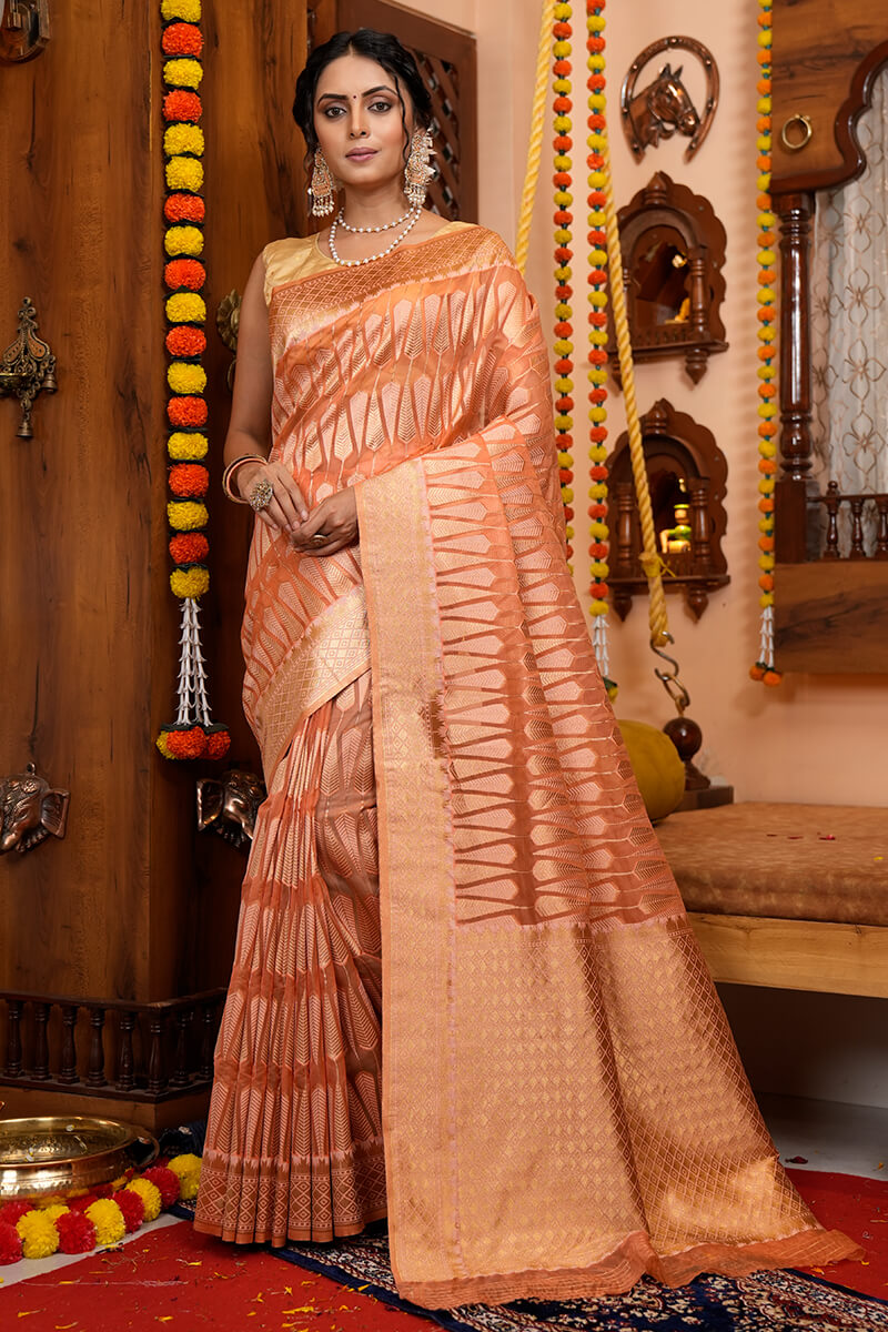 Smashing Peach Organza Silk Saree With Incredible Blouse Piece