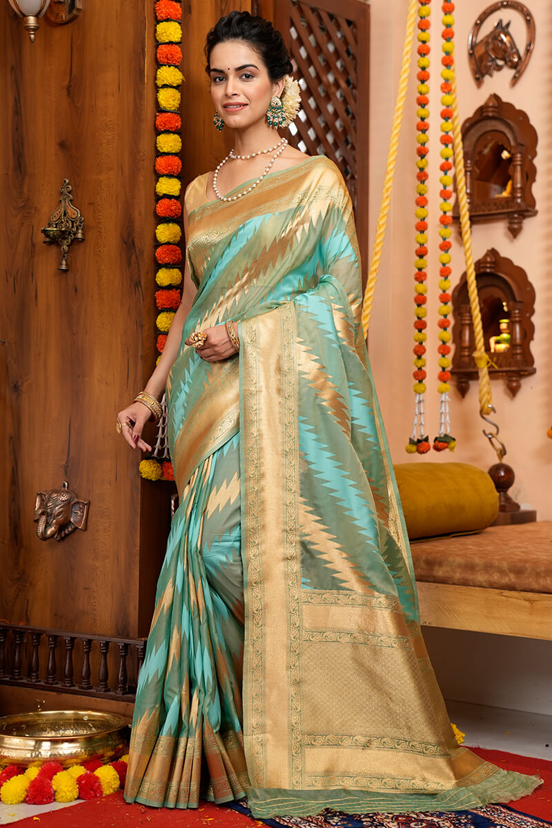 Splendorous Firozi Organza Silk Saree With Magnificat Blouse Piece