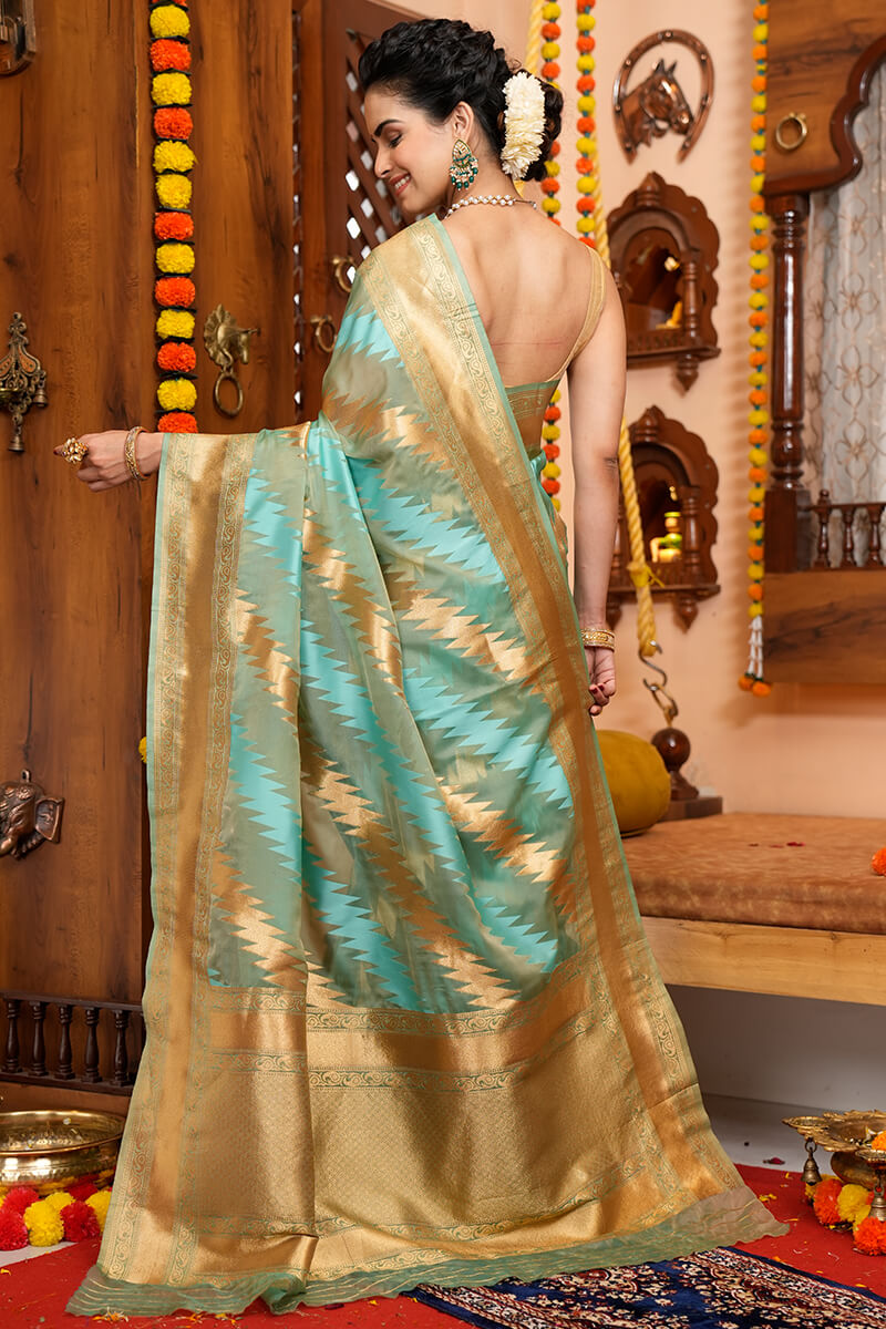 Splendorous Firozi Organza Silk Saree With Magnificat Blouse Piece