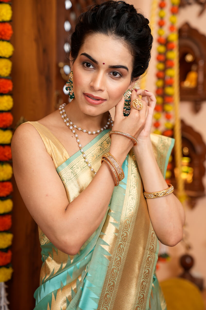 Splendorous Firozi Organza Silk Saree With Magnificat Blouse Piece