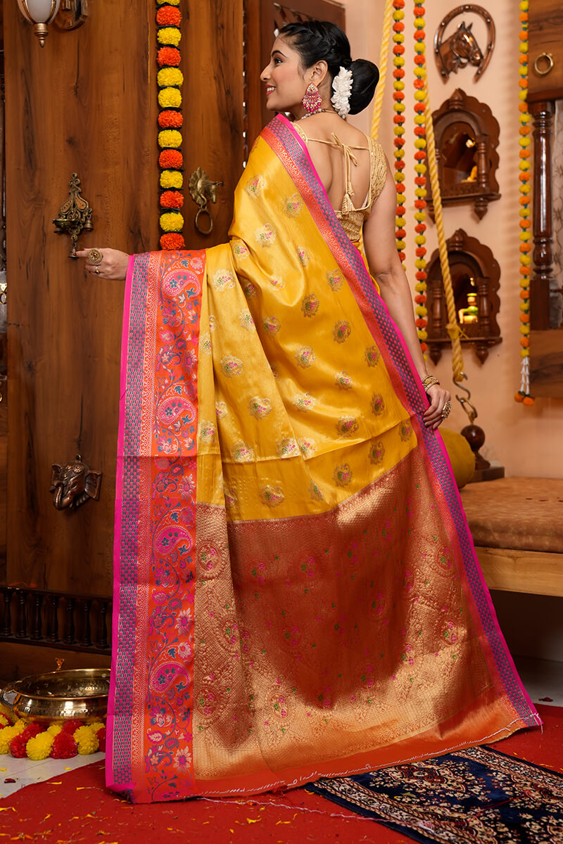 Charming Yellow Soft Banarasi Silk Saree With Deserving Blouse Piece