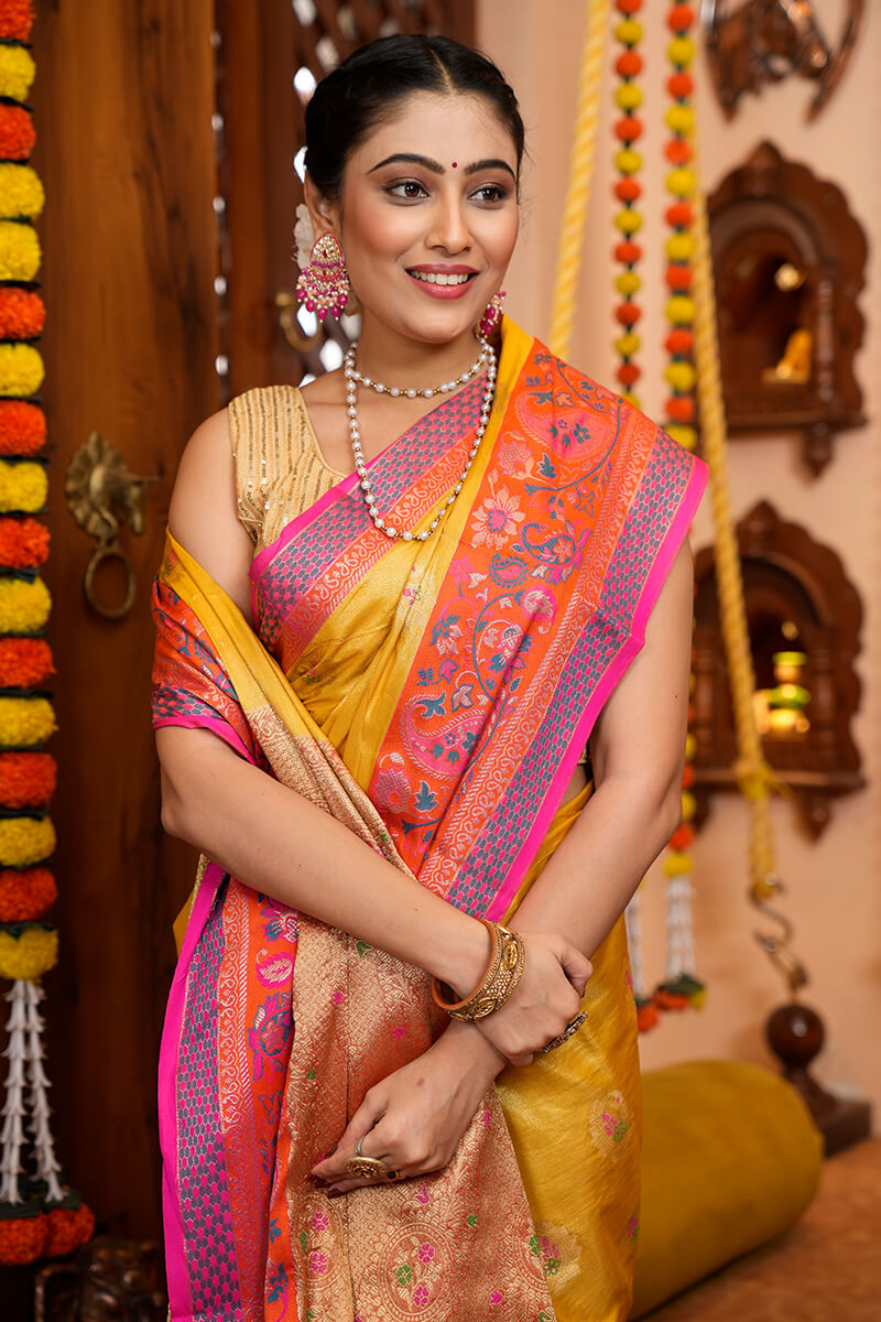 Charming Yellow Soft Banarasi Silk Saree With Deserving Blouse Piece