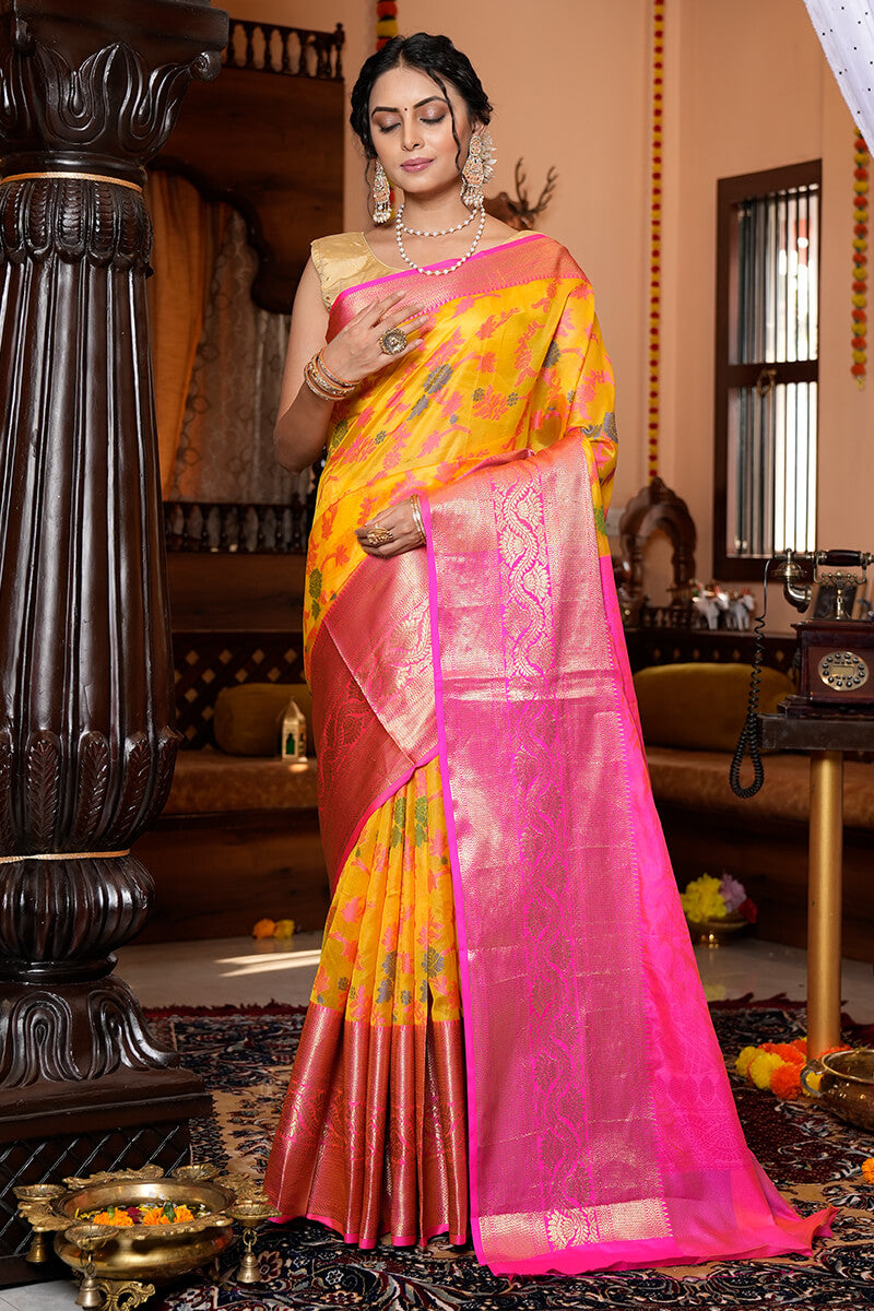 Prominent Yellow Organza Silk Saree With Snappy Blouse Piece