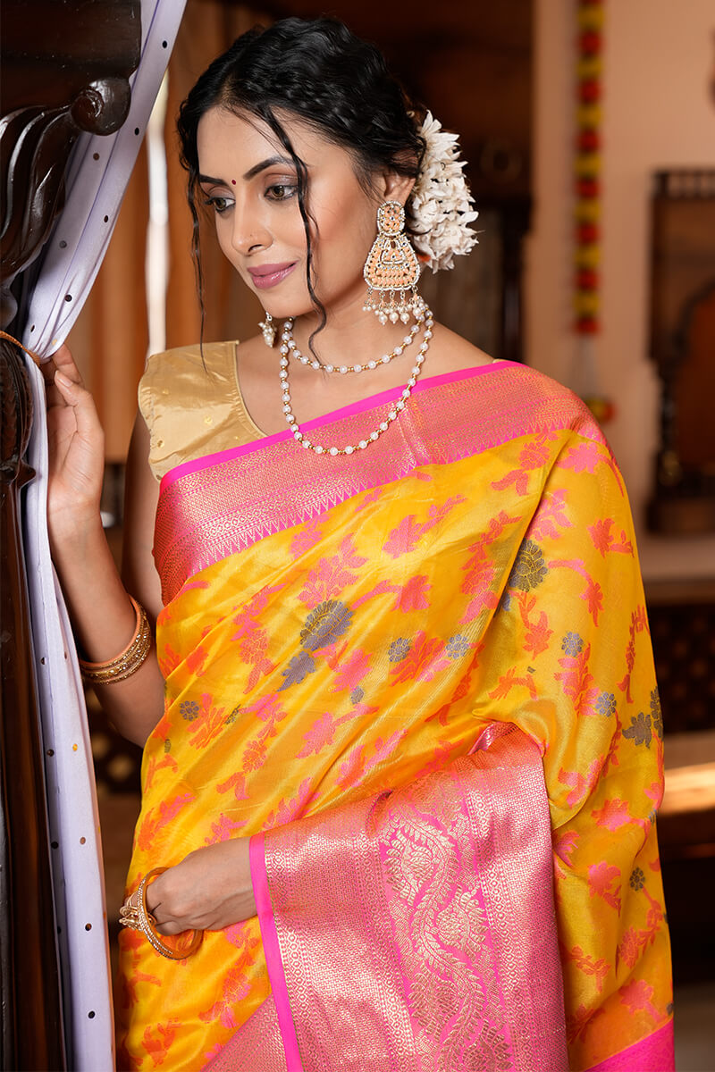 Prominent Yellow Organza Silk Saree With Snappy Blouse Piece