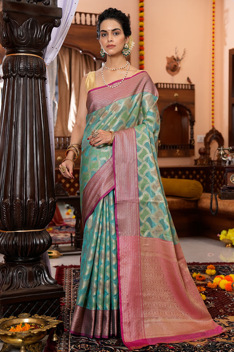 Majesty Firozi Organza Silk Saree With Palimpsest Blouse Piece