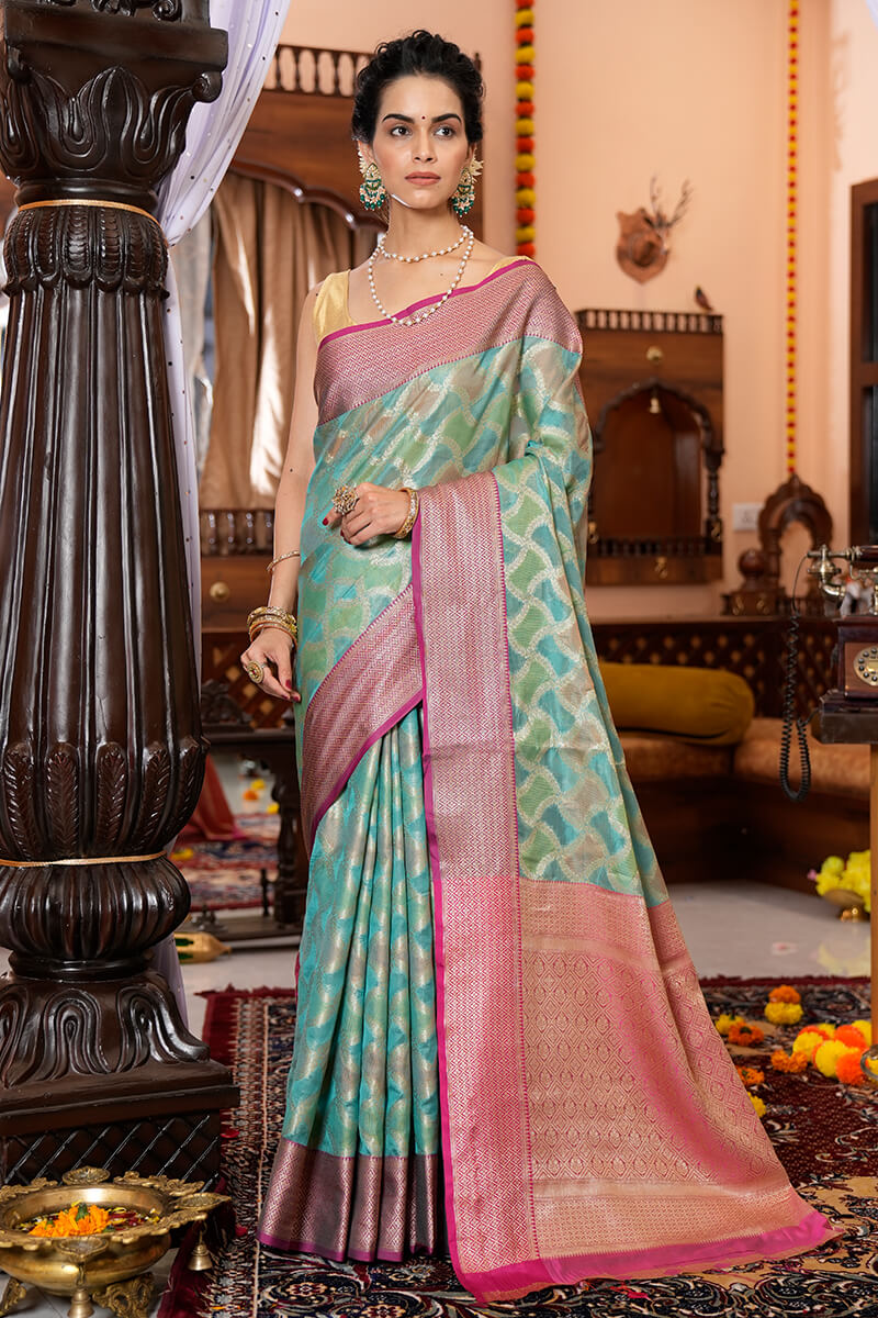 Majesty Firozi Organza Silk Saree With Palimpsest Blouse Piece