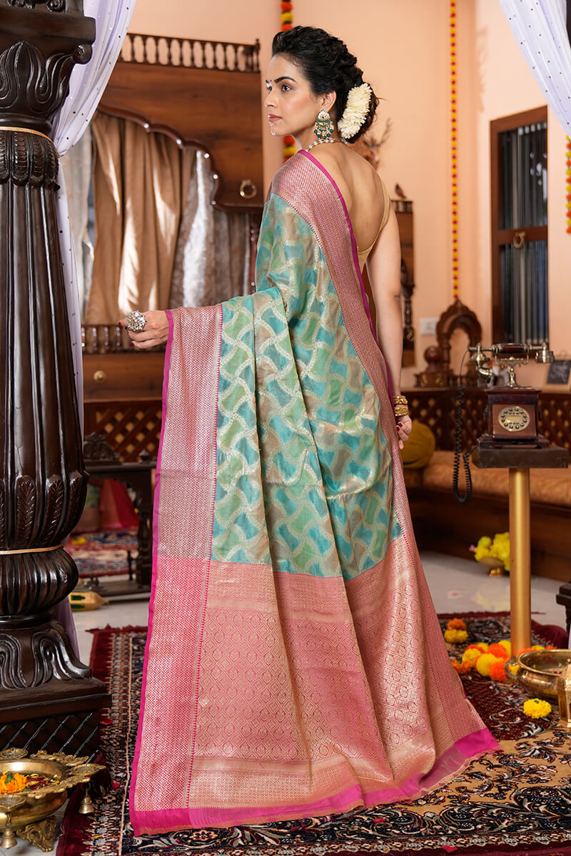 Majesty Firozi Organza Silk Saree With Palimpsest Blouse Piece