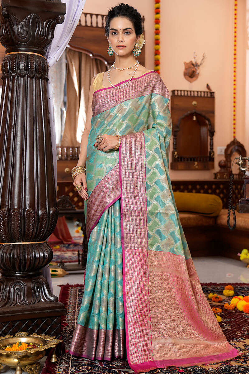Majesty Firozi Organza Silk Saree With Palimpsest Blouse Piece
