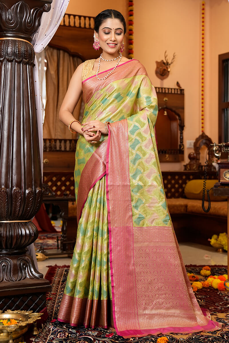 Blissful Green Organza Silk Saree With Redolent Blouse Piece