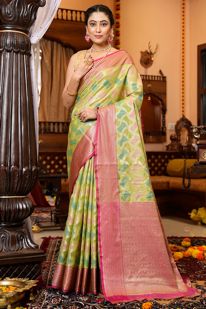 Blissful Green Organza Silk Saree With Redolent Blouse Piece