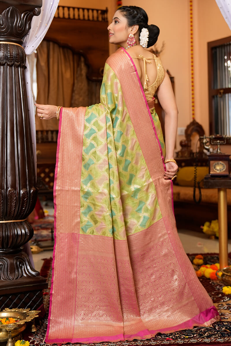 Blissful Green Organza Silk Saree With Redolent Blouse Piece