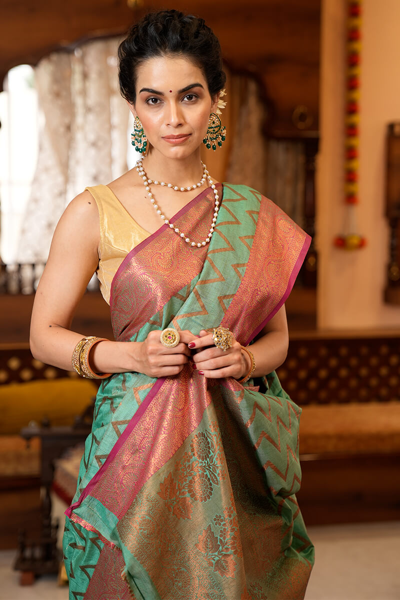 Assemblage Sea Green Soft Banarasi Silk Saree With Jazzy Blouse Piece