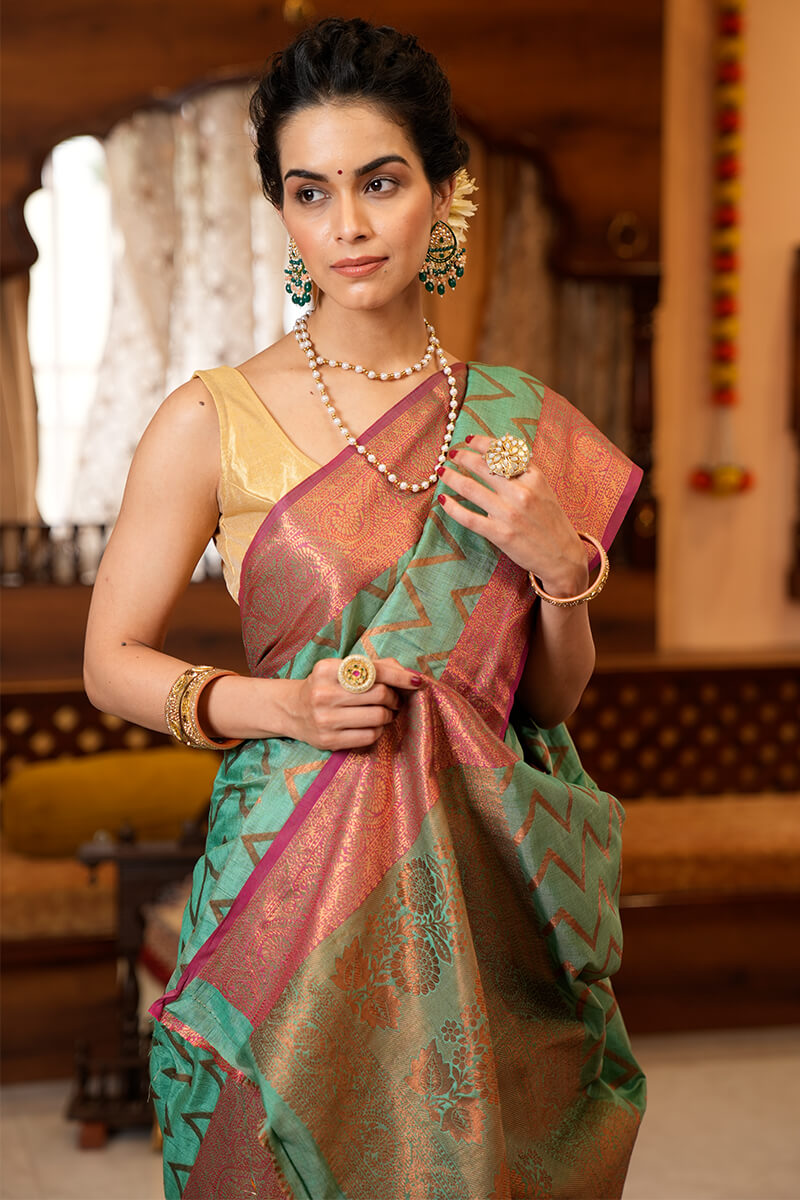 Assemblage Sea Green Soft Banarasi Silk Saree With Jazzy Blouse Piece