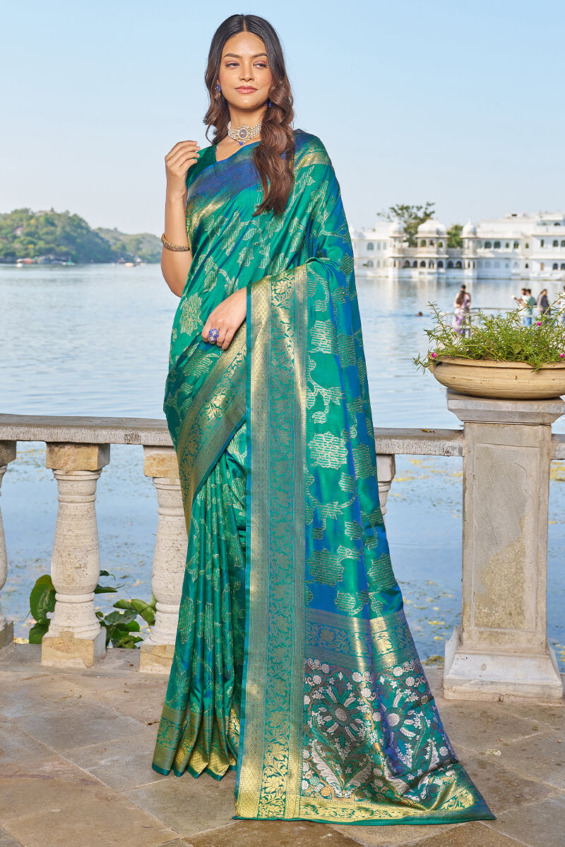 Jazzy Rama Kanjivaram Silk Saree With Engaging Blouse Piece