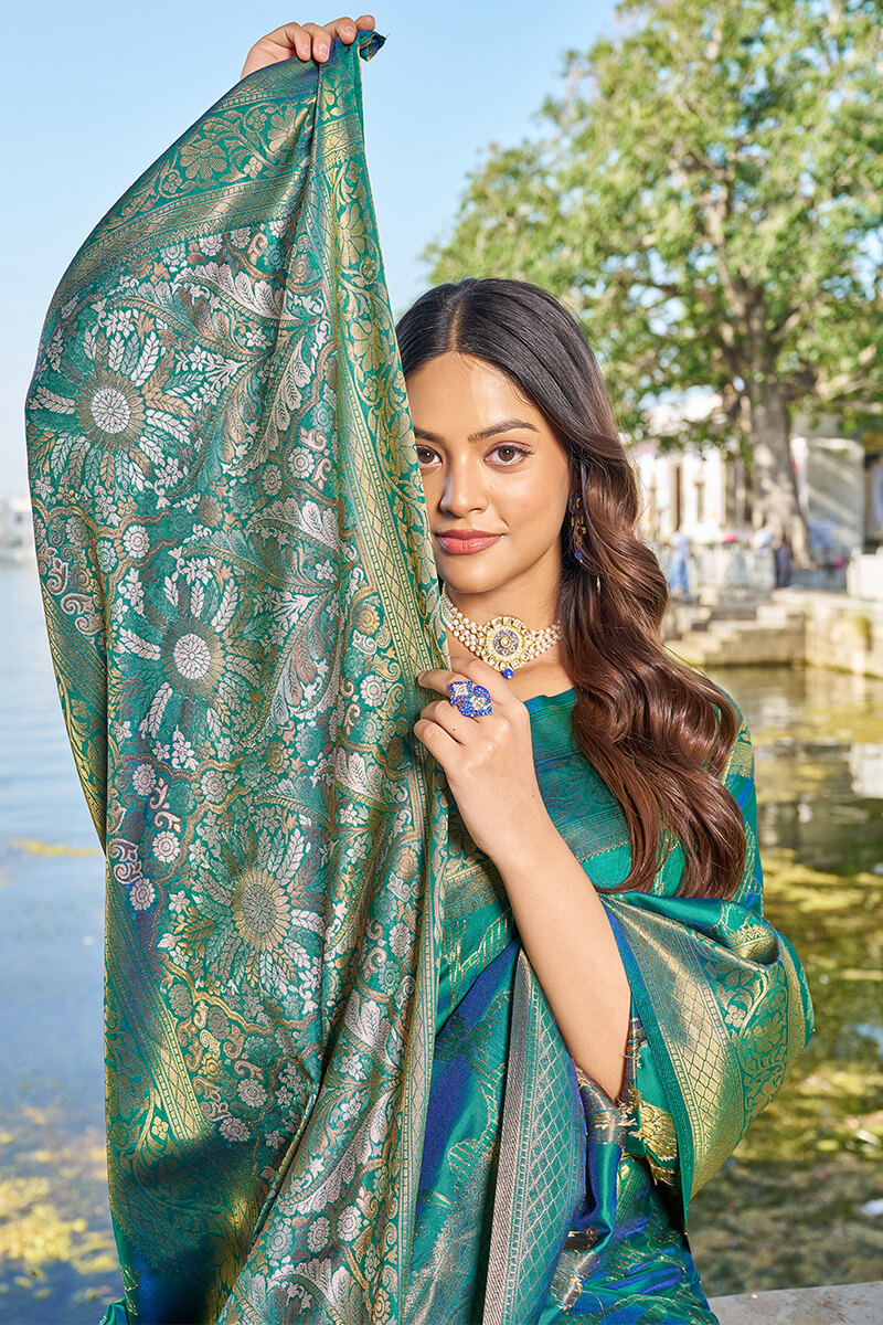 Jazzy Rama Kanjivaram Silk Saree With Engaging Blouse Piece