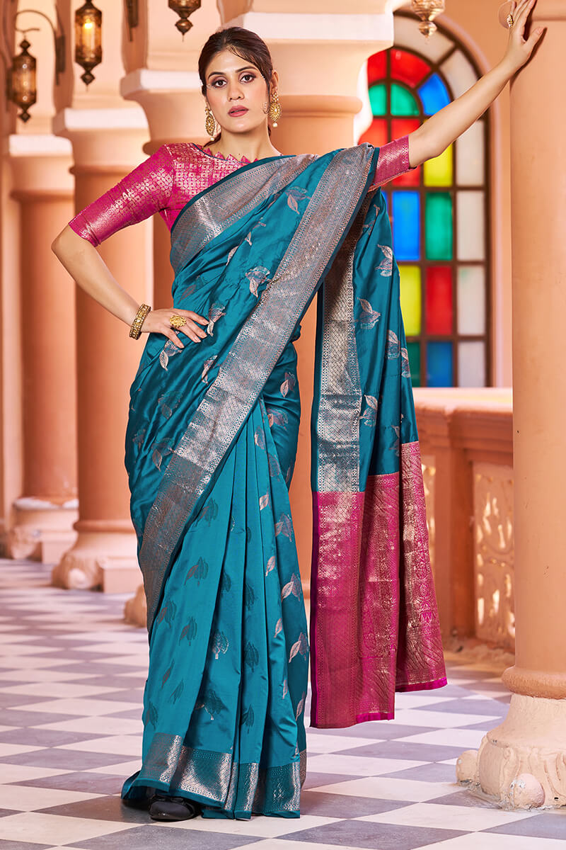 Stunner Rama Soft Banarasi Silk Saree With Enchanting Blouse Piece