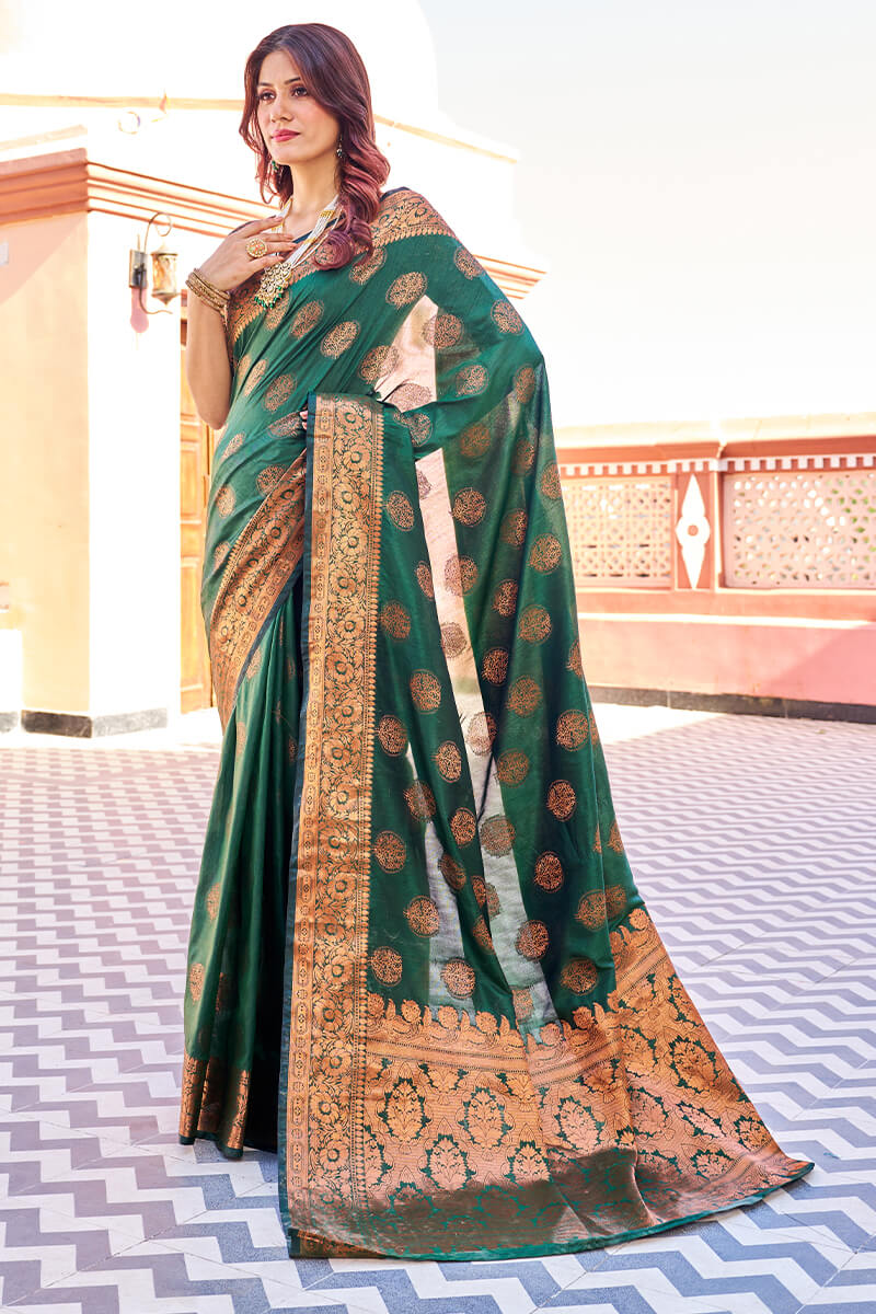 Blooming Dark Green Banarasi Silk Saree With Engrossing Blouse Piece