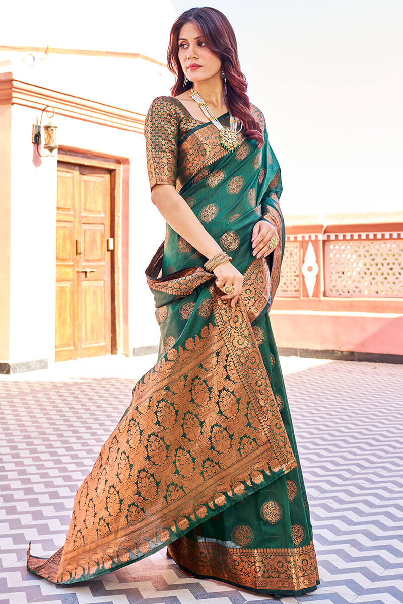 Blooming Dark Green Banarasi Silk Saree With Engrossing Blouse Piece