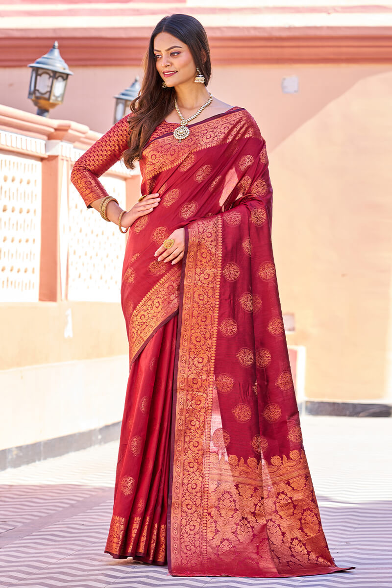 Adorable Maroon Banarasi Silk Saree With Hypnotic Blouse Piece