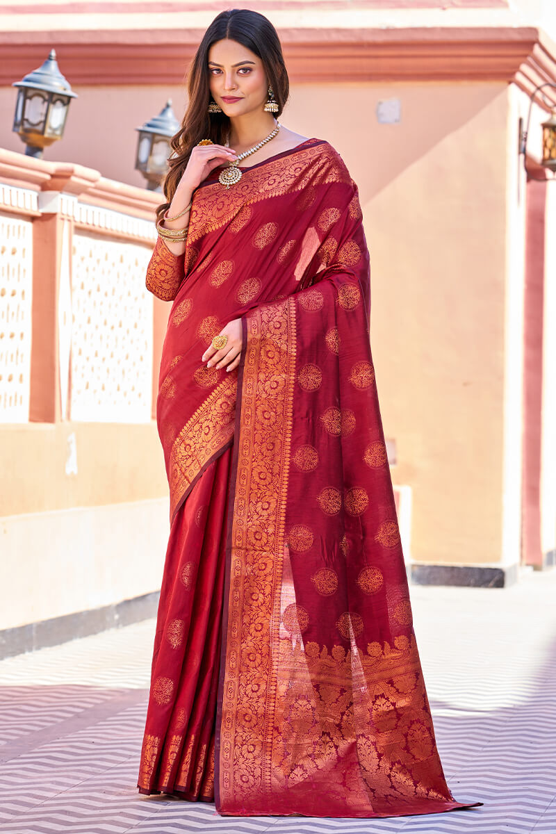 Adorable Maroon Banarasi Silk Saree With Hypnotic Blouse Piece