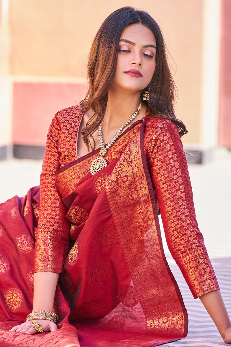 Adorable Maroon Banarasi Silk Saree With Hypnotic Blouse Piece