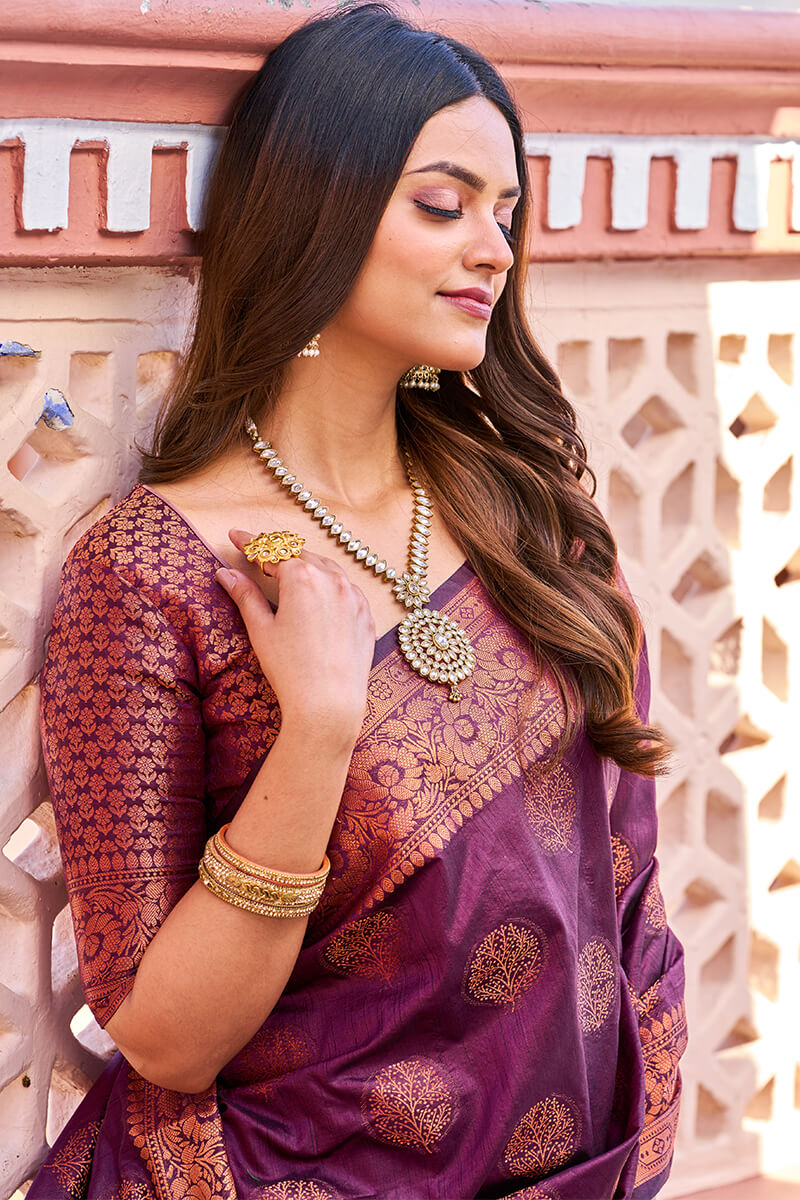 Flamboyant Purple Banarasi Silk Saree With Adorning Blouse Piece
