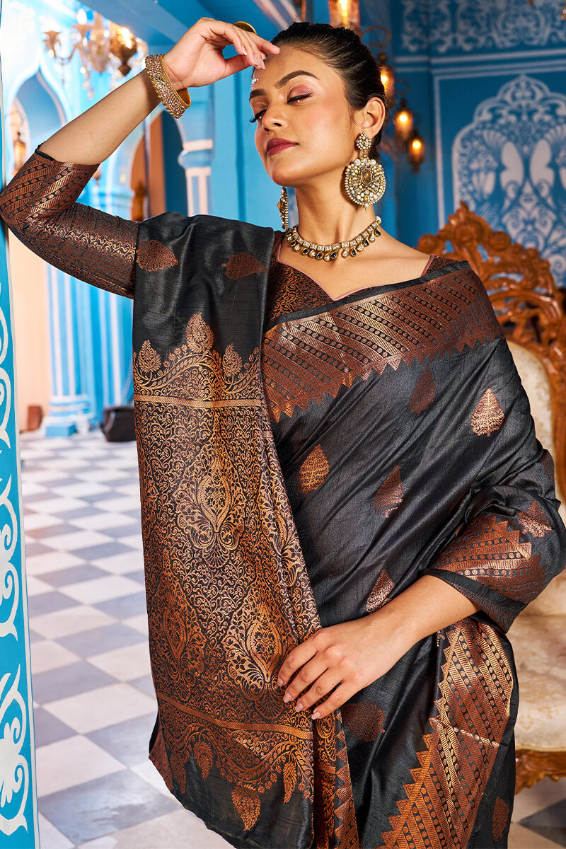 Appealing Black Banarasi Silk Saree With Desiring Blouse Piece