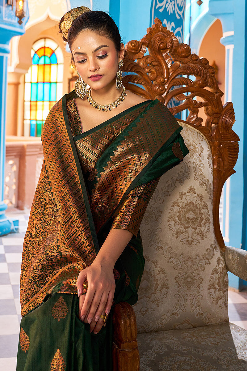 Blooming Dark Green Banarasi Silk Saree With Ethnic Blouse Piece