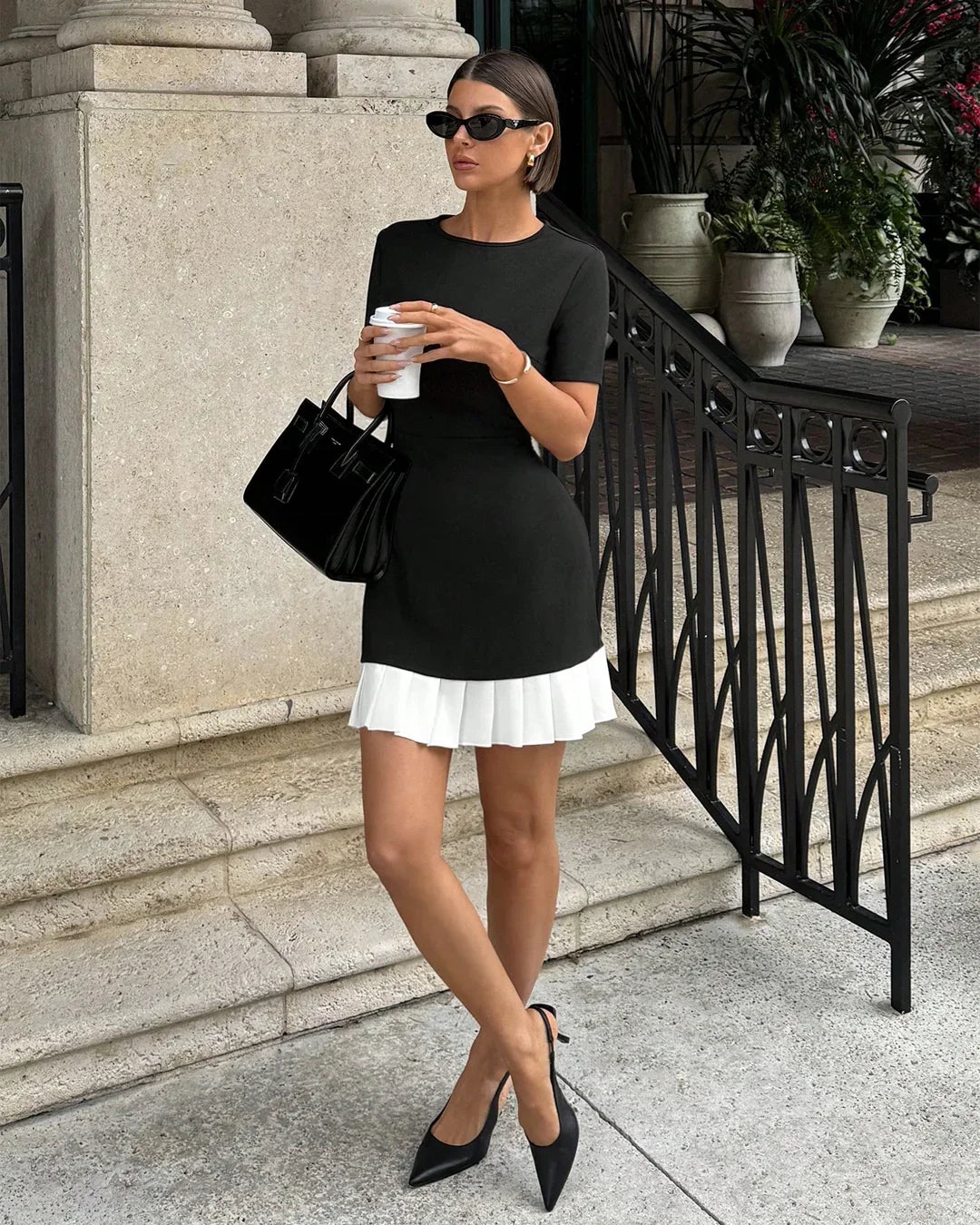 Black Mini Dress with White Pleated Hem