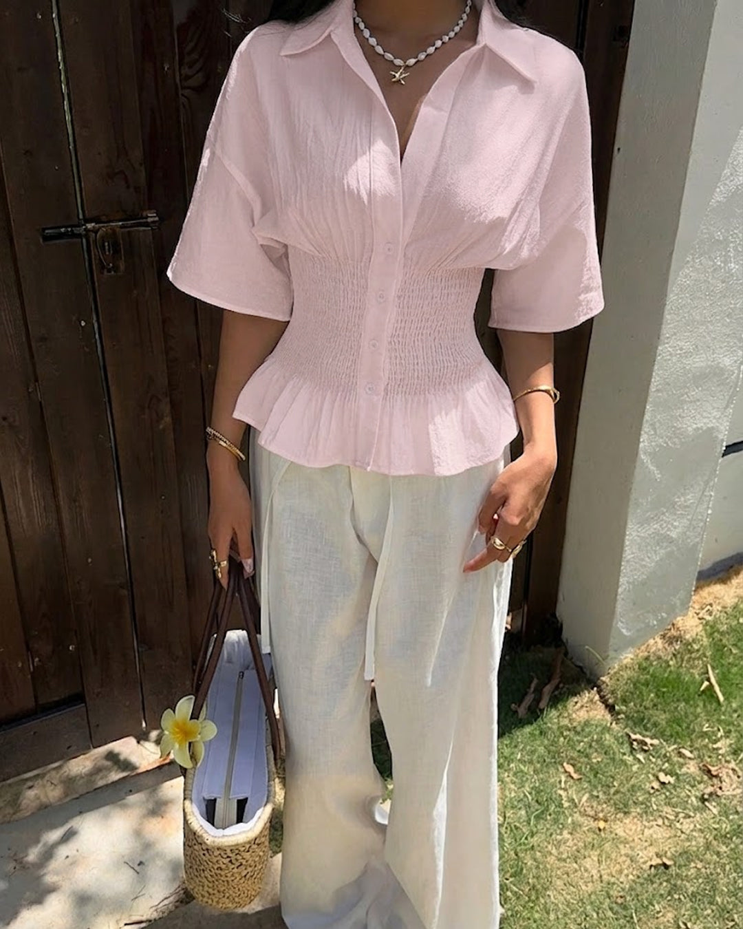 Collared Neck Smocked Waist Flared Hem Top in Baby Pink