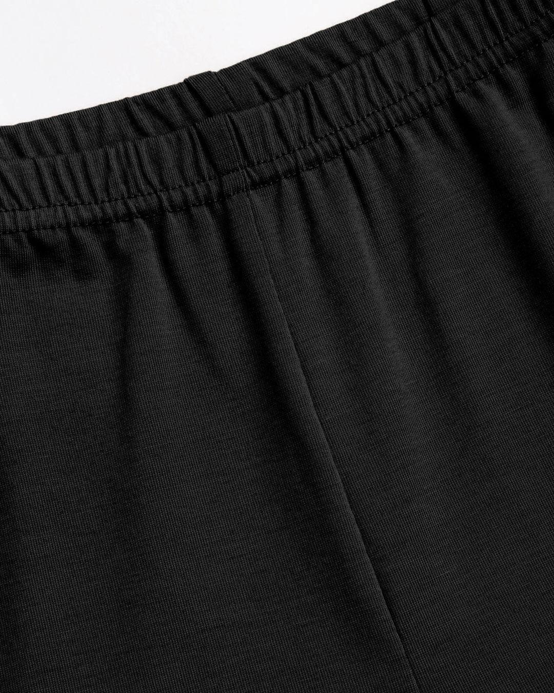 High-Rise Flared Trousers in Black