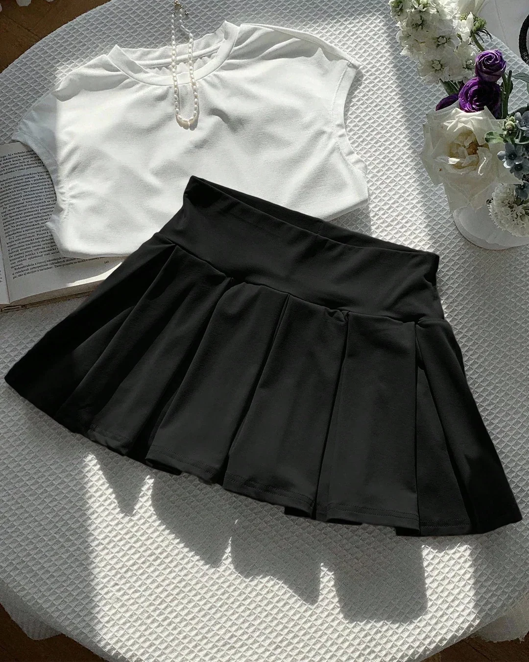 High-Waist Pleated Flared Mini Skirt in Black