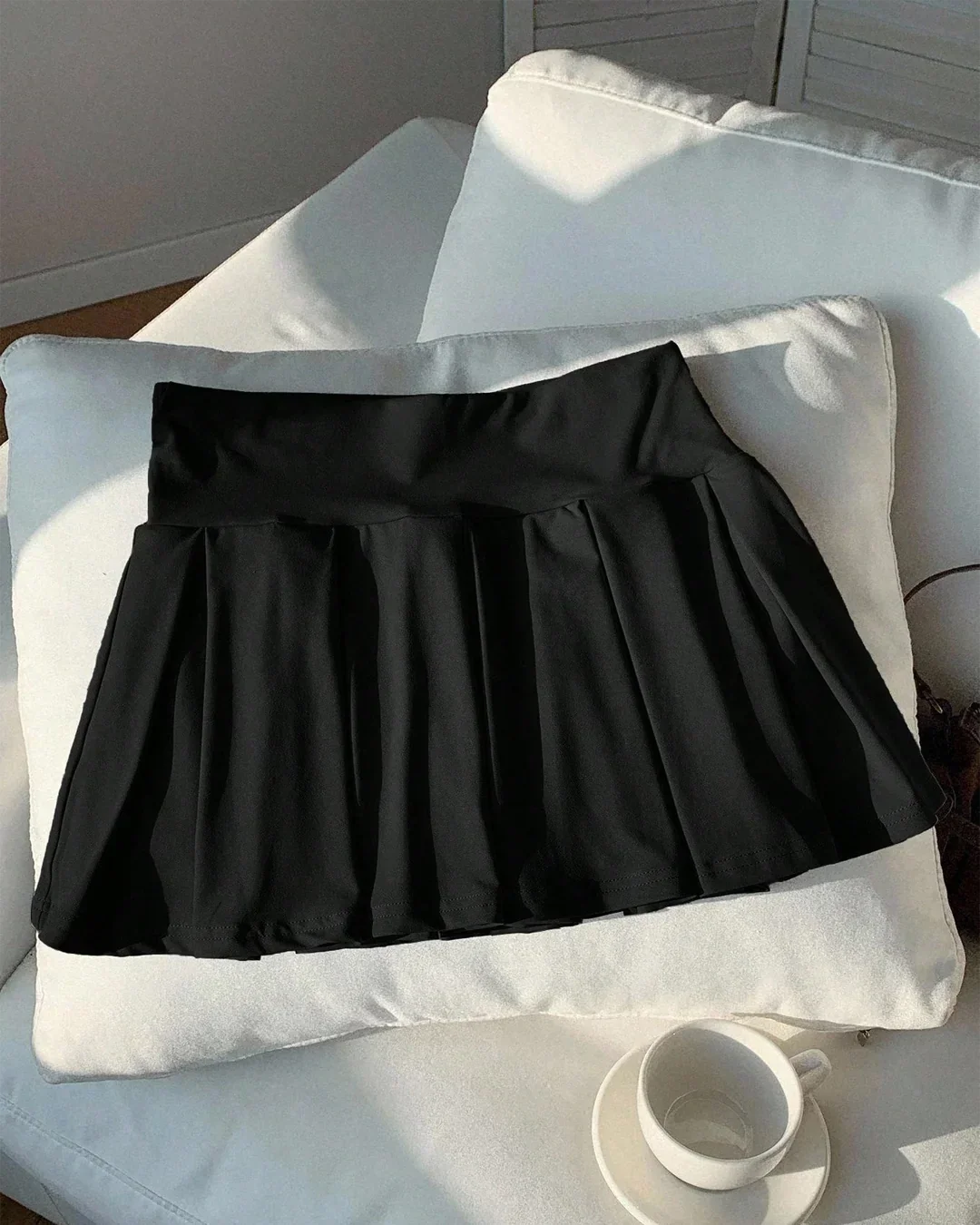 High-Waist Pleated Flared Mini Skirt in Black
