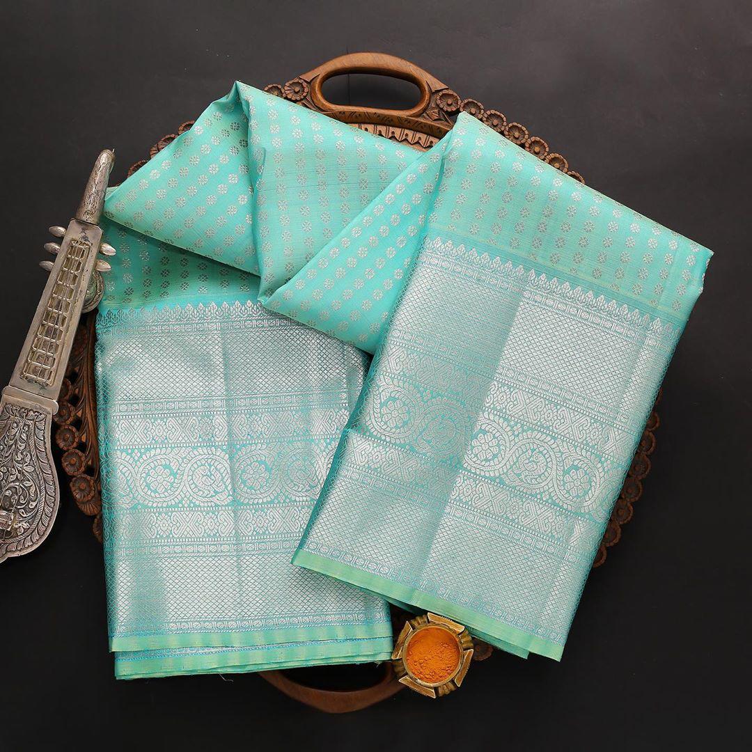 Tempting Firozi Soft Silk Saree With Dalliance Blouse Piece
