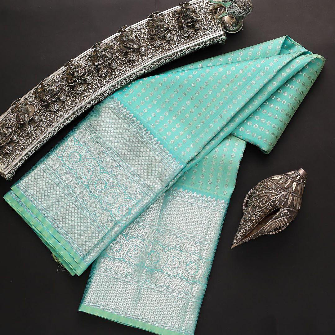Tempting Firozi Soft Silk Saree With Dalliance Blouse Piece