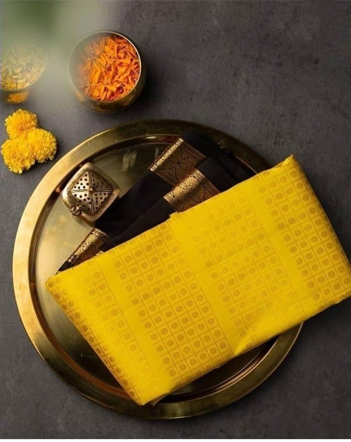 Sizzling Yellow Soft Banarasi Silk Saree With Magnetic Black Blouse Piece