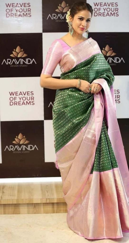 Elaborate Dark Green Soft Silk Saree With Redolent Blouse Piece