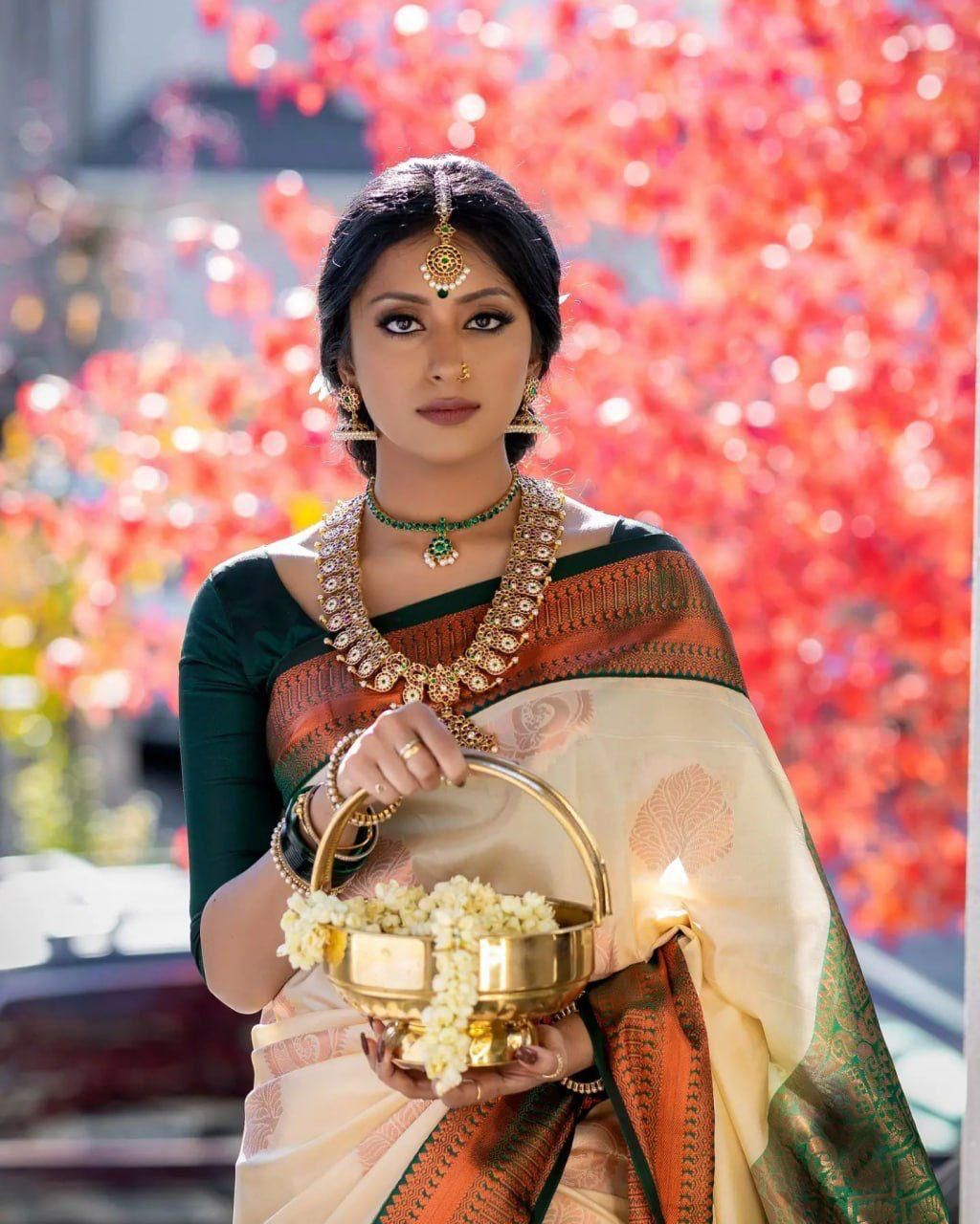 Cynosure Beige Soft Silk Saree With Inspiring Blouse Piece