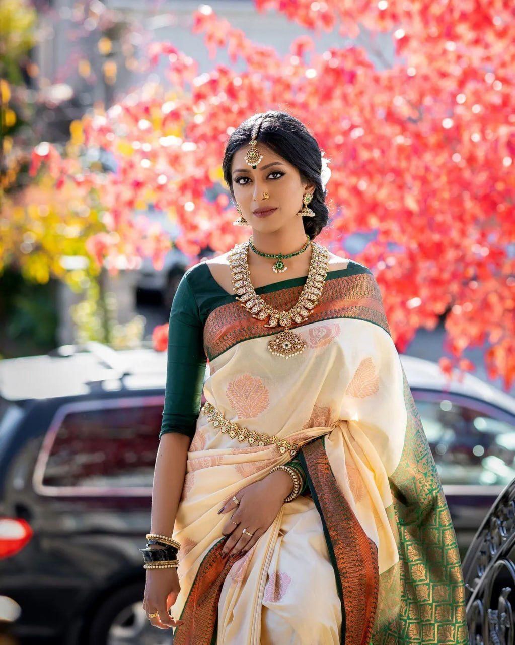 Cynosure Beige Soft Silk Saree With Inspiring Blouse Piece