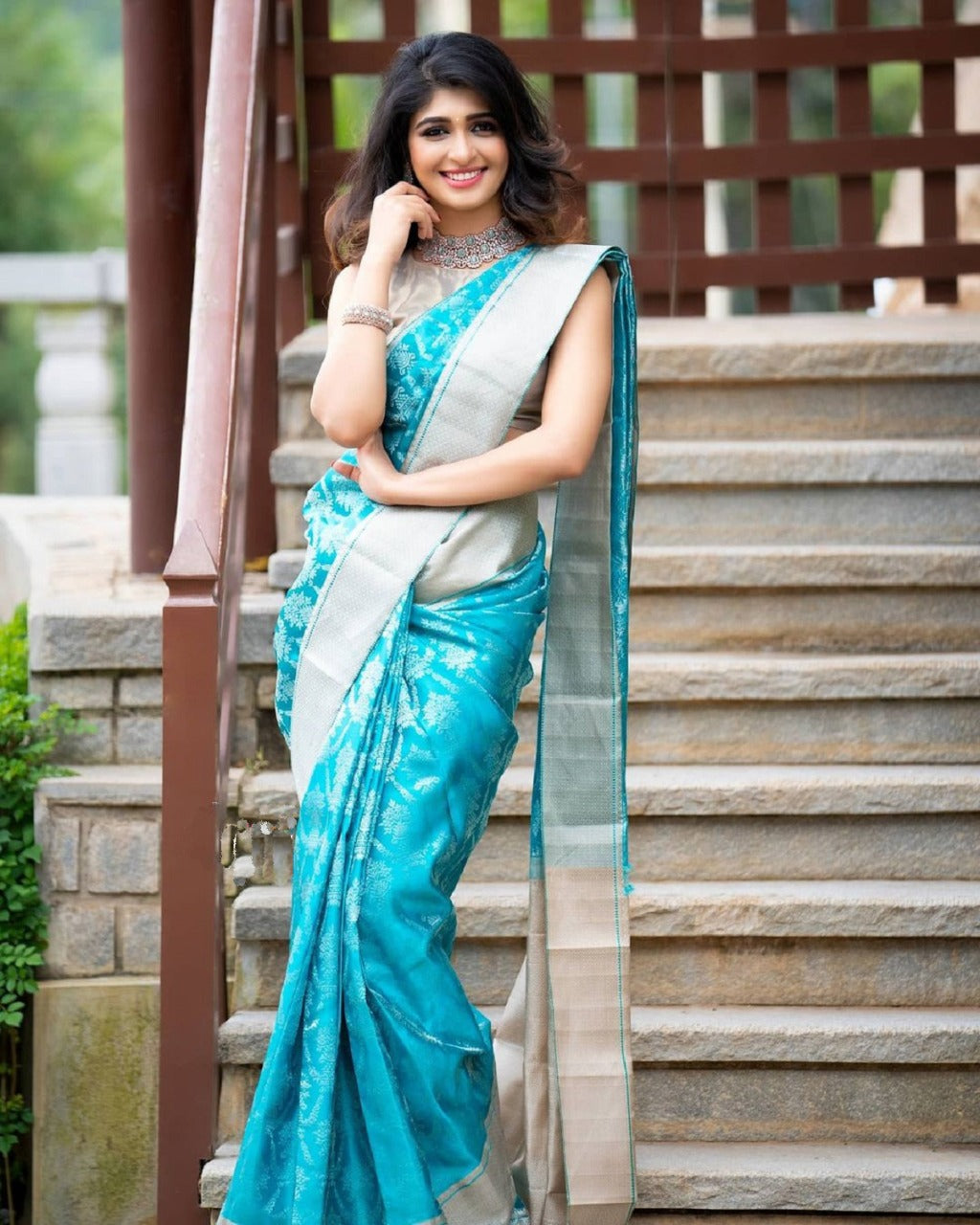 Outstanding Firozi Soft Banarasi Silk Saree With Prettiest Blouse Piece